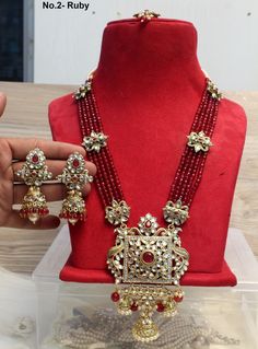 *Light Weight Gold Rani Haar Necklace Set. *No.1-  Gold  *Haar length: 14.50 inches (including pendant) *Pendant Breadth- 3 inches *Earrings length: 3.5 inches  (with drops) ;   *earrings Width: 1.5 inches *No.2- ruby maroon *Haar length: 14.50 inches (including pendant) *Pendant Breadth- 3 inches *Earrings length: 3.5 inches  (with drops) ;   *earrings Width: 1.5 inches *No.3- Green *Haar length: 14.50 inches (including pendant) *Pendant Breadth- 3 inches *Earrings length: 3.5 inches  (with dro Traditional Long Necklace For Festive Gift, Traditional Festive Long Necklace As Gift, Traditional Festive Long Necklace For Gift, Eid Kundan Necklaces With Latkans, Traditional Long Kundan Necklace For Celebrations, Long Kundan Necklace With Intricate Design For Celebration, Long Kundan Necklace With Meenakari Detail, Intricate Long Kundan Necklace For Celebration, Festive Long Kundan Necklace For Festivals