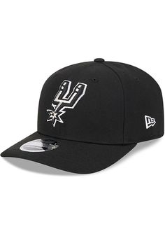 This San Antonio Spurs Black Adjustable Hat features a front embroidered team logo on a structured polyester crown with pre-curved visor, inner stretch sweatband, and adjustable closure. New Era Evergreen 9SEVENTY Stretch Snap, Front embroidered team logo, Left embroidered New Era logo, Snapback closure, Featherweight Polyester, Curved Bill, High Crown, Structured, Imported Adjustable Black Hats For Sports Events, Black Trucker Hat With Embroidered Logo For Fans, Sports Hat With Logo And Curved Visor, Sports Hat With Curved Visor And Logo, Black Curved Visor Hat For Baseball Season, Black Hat With Curved Visor For Baseball Season, Adjustable Black Hat With Sweatband, Adjustable Black Sports Visor, Adjustable Team Spirit Baseball Cap With Curved Brim