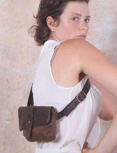 Waxed Canvas Sling Bag, Brown Leather Festival Fanny Pack #ruthkrausbags, #shoulderbag #leatherbags #manstyle, #smallleatherhandbags, #fashionman, #fashionbags, #leathercraft, #manfafhion, #handbags, Daily Use Leather Shoulder Bag With Belt, Leather Shoulder Bag With Belt For Daily Use, Everyday Leather Shoulder Bag With Belt, Versatile Leather Belt Bag With Pockets, Brown Chest Bag With Belt Loops For Everyday Use, Travel Leather Belt Bag With Belt Included, Blue Sling Bag, Distressed Leather Bag, Sling Bags Women