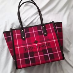 New Kate Spade Bright Rose Ella Plaid Tote Wkr00604 $299 Condition: New With Tag Details 11.2"H X 16.8"W X 6.8"D Handle Drop: 8.5'' Fabric Printed Logo Canvas Lining Interior Back Zip Pocket Drop In Top Zip Closure Dust Bag Not Included Kate Spade Red Rectangular Shoulder Bag, Kate Spade Luxury Red Bag, Luxury Red Kate Spade Shoulder Bag, Luxury Red Kate Spade Bag, Kate Spade Red Travel Bag, Kate Spade Red Tote Shoulder Bag, Kate Spade Red Bags For Daily Use, Red Kate Spade Shopping Bag, Red Kate Spade Bag For Shopping