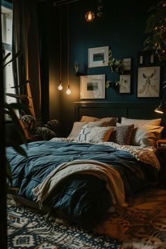 a bedroom with dark green walls and blue comforter on the bed, plants in the corner