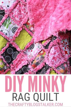 a pink and black quilt with the words diy minky rag quilt