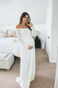 A solid hued maternity maxi dress featuring an off shoulder neckline, long sleeves, and elastic cinching under the bust. Off Shoulder Neckline, Maternity Maxi Dress, Maternity Maxi, Pregnancy Maxi Dress, Personal Marketing, Maternity Clothes, White Formal Dress, Over 50, Blush Pink