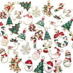 christmas decorations and ornaments are arranged on a white surface with red, green, and gold trimmings