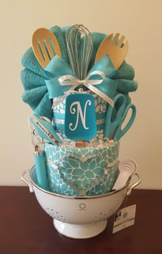 a basket filled with kitchen utensils on top of a table