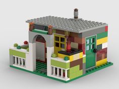 a lego house is shown with the front door open and windows on each side,