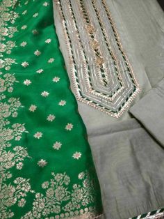 Item Overview ATHARVA Hand Embroidery Salwar Kameez w/Embroidered Neck Grey/Banarsi Silk Dupatta Green/Tunic Pants/Patiala Salwar/Churridar/Custom Stitch/ Dno. CH1455 Fabric: * Shirt Chanderi 2.5 Mts, Grey - Embroidered Neck * Dupatta: Banarsi Silk Dupatta 2.5 Mts. (Motifs May Wary) * Bottom Santoon Silk 2.5 Mts. Excusive Hand Embroidered Party Wear Punjabi Suit. Customization: * Fabrics Customization: Designs Can be made in different Fabrics. *Color Customization: Designs can be made in any col Patiala Salwar Kameez, Green Tunic, Embroidered Pants, Patiala Salwar, Punjabi Suit, Silk Dupatta, Different Fabrics, Anarkali, Salwar Kameez