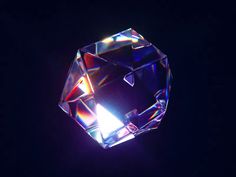 a diamond shaped object in the dark with light coming from it's center hole