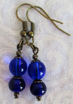 Beaded dark blue drop earrings Juicybeads Jewelry Blue Beaded Earrings For Gifts, Nickel-free Blue Beaded Earrings For Gifts, Blue Round Beaded Earrings For Gift, Nickel-free Blue Beaded Earrings As Gift, Blue Round Beaded Earrings As Gift, Blue French Hook Jewelry As Gift, Blue Earrings With Dangling Beads As Gift, Blue Drop Earrings, Colorful Jewelry