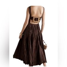 Cult Gaia Evening Gown "Slipping Into Something More Comfortable Takes On A Different Meaning With Cult Gaia And This Ruched Satin Maxi Dress, The Angela. The ""Soil"" Brown Design Has A V-Neckline Which Leads Into A Yoked, Empire Waist Before Falling Into An Ankle-Length Skirt. Note The Open Back With An Oversized Buckle Detail When Posing For Those Golden-Hour Photos. Cult Gaia Angela Ruched Satin Maxi Dress"Pleated Accents Sleeveless With V-Neck Concealed Zip Closure At Side Estimated Item Me Brown A-line Midi Dress For Evening, Brown Summer Party Slip Dress, Brown A-line Midi Dress For Party, Elegant Brown Slip Dress For Party, Brown Midi Party Dress, Brown Midi Length Party Dress, Backless Brown Maxi Dress For Party, Brown Backless Maxi Dress For Party, Elegant Brown Backless Maxi Dress