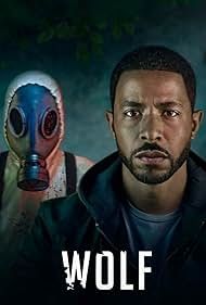 two men wearing gas masks with the words wolf in front of them and an image of a man's face