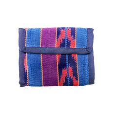 Our Cotton Billfold Wallet makes for a great gift (either for a loved one or yourself)! Made with traditional Guatemalan fabric, it has a Velcro closure to keep valuables in place. Each wallet has 8 ID/credit card slots and 1 larger pocket for paper money. In addition, each wallet is trimmed and lined with hand-woven cotton with matching Guatemalan fabric accents on the interior. As always, Handmade and Fair Trade! 9 1/2"L x 5"W (fully opened) 4"H x 5"W (closed) 8 Interior ID/Credit Card Slots 1 Foldable Rectangular Wallet For Daily Use, Blue Rectangular Trifold Wallet With Coin Pocket, Multicolor Bifold Bags For Everyday Use, Multicolor Bifold Bags With Card Slots, Multicolor Bifold Travel Bag, Blue Wallets With Coin Pocket As Gift, Multicolor Travel Clutch With Card Slots, Blue Wallet With Coin Pocket As Gift, Blue Rectangular Trifold Wallet For Daily Use