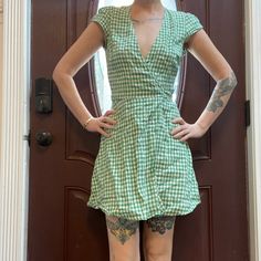 I Poshed This New With Tags, Never Worn. It’s Been Sitting In My Closet Wrinkling. My Puppy Chewed The Tag, I Can Include It If You Want It. Purchased This For A Wedding, Found It Too Casual And Chesty For Me. Super Cute Picnic Dress! Reformation Gingham Tie Wrap Dress Size Xs Fits Like A Small Green Mini Dress For Picnic, Fitted V-neck Plaid Dress For Spring, Casual V-neck Plaid Dress, Casual Plaid V-neck Dress, Casual Green Mini Dress For Picnic, Casual Cotton Plaid Dress With V-neck, Casual Plaid Cotton V-neck Dress, Gingham V-neck Mini Dress For Picnic, Chic Green Mini Dress For Picnic