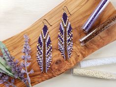 Inspired by the bright feathers of the Purple Grenadier, these earrings are handwoven. Made with quality Japanese (Toho) glass beads. Strong nylon beading thread. Beautiful contrasting coloring will add pop and sparkle to any outfit whether casual or formal. (Approximate size with ear wire: Length 10.5cm; Width 2.5cm) All earring hook options are hypoallergenic. Choice of: surgical grade Titanium, Niobium or 14k Gold-Filled. As someone who has struggled with very sensitive ears my whole life, I Beaded Feather Earrings, Beaded Fringe Earrings, Beading Thread, Nature Earrings, Earring Hook, Beaded Fringe, Earrings Long, Bead Jewellery, Feather Earrings