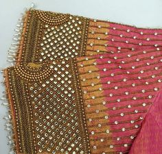 two pieces of cloth with beading on them, one pink and one gold color