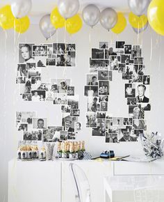 a table with balloons and pictures on the wall in front of it that says celebration lolsam