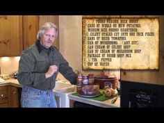 a man standing in front of a kitchen counter with food items on the counter top