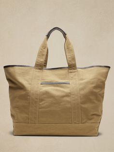 Large Canvas Tote | Banana Republic Brown Double Handle Canvas Bag With Pockets, Everyday Duck Canvas Bag With Double Handle, Duck Canvas Double Handle Bag For Everyday Use, Everyday Use Double Handle Duck Canvas Bag, Brown Duck Canvas Tote Bag, Duck Canvas Bag With Leather Handles For Everyday Use, Canvas Tote Shoulder Bag With Pockets, Waxed Canvas Tote For Weekend Trips, Casual Canvas Tote Travel Bag