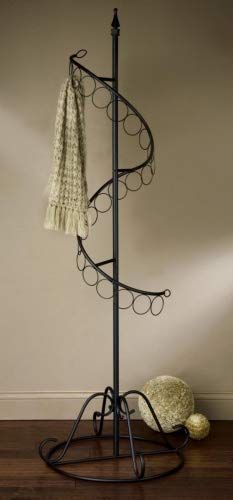 a coat rack with a hat and scarf on it