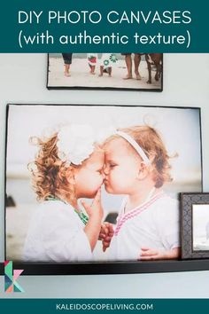 a couple of pictures hanging on the side of a wall next to a framed photo