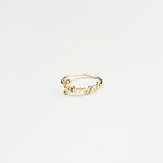 CUSTOM NAME RING - F105 This ring is a new addition to our Name Ring collection. You can customize it with any name or word of your choice. Basic symbol such as heart, star, &, # is available to add in, just put your request in note box at check out. * SIZE OF LETTERS: capital letters approximately 6mm high. * MATERIAL: Sterling Silver 925. * COLOR: Silver, 18k Gold Vermeil, Rose Gold Vermeil. --- Vermeil is made of thick 18k gold or rose gold layered on .925 sterling silver. Vermeil is nick Promise Ring With Custom Nameplate, Custom Name Adjustable Nameplate Ring, Custom Name Plate Ring For Promise, Personalized 14k Gold Symbolic Rings, Personalized Symbolic 14k Gold Rings, Symbolic Personalized 14k Gold Rings, Custom Name White Gold Round Ring, Custom Name White Gold Ring, Custom Name Engraved Yellow Gold Ring