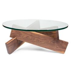 a glass and wood coffee table with an upside down design