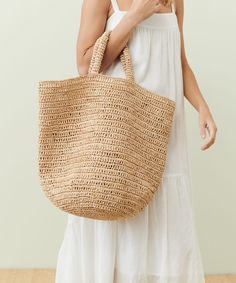 Woven Raffia Tote Natural OS Natural Beach Bag With Rolled Handles For Daily Use, Daily Use Straw Beach Bag With Rolled Handles, Natural Color Rectangular Crochet Bag With Rolled Handles, Rectangular Natural Crochet Bag With Rolled Handles, Natural Rectangular Crochet Bag With Rolled Handles, Eco-friendly Spring Bag With Rolled Handles, Eco-friendly Straw Travel Bag With Rolled Handles, Eco-friendly Bags With Rolled Handles For Spring, Summer Straw Beach Bag With Rolled Handles