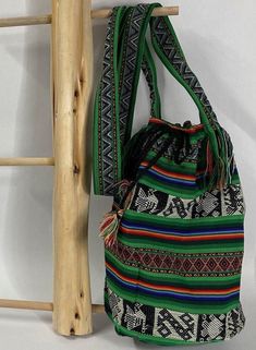 Peruvian Handmade Bucket Bag in Green #73-G This is a simple and fun handmade bucket bag from Peru.  It is made of  lightweight Andean fabric (not thick wool) in bold colors and designs common to Peruvian style.   Features *Tie Closure Specifications *Approximate Dimensions:   14" Height | 9" Diameter  Materials *Andean Textile  Handcrafted in Peru Peruvian Style, Thick Wool, Bag Green, Green Bag, Bold Colors, Peru, Purses And Handbags, Bucket Bag, Shoulder Bags