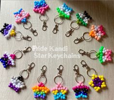 a bunch of key chains that are made to look like beads and flowers on them