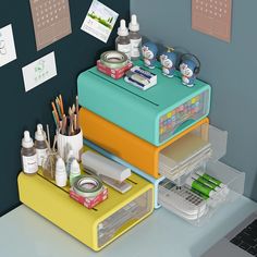 an assortment of office supplies are stacked on top of each other