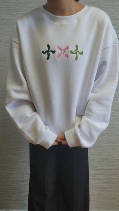 This cozy sweatshirt is perfect for any Kpop fan looking to add some style to their wardrobe. Crafted from high-quality cotton fabric, our crewneck sweatshirt is soft, comfortable, and durable. The front of the sweatshirt features a beautiful embroidery of the txt logo, showcasing your love and support for this talented Kpop group. The sweatshirt is available in a range of sizes to suit all body types, and the classic design makes it a versatile addition to any outfit. Wear it to concerts, fan m Kpop Cotton Long Sleeve Hoodie, Kpop Long Sleeve Sweatshirt For Winter, Kpop Letter Print Sweatshirt For Streetwear, Kpop Style Letter Print Sweatshirt For Streetwear, Kpop Style Sweatshirt For Fall Streetwear, Kpop Style Fall Sweatshirt For Streetwear, Kpop Long Sleeve Sweatshirt With Letter Print, Kpop Style Long Sleeve Sweatshirt With Letter Print, Kpop Style Cotton Sweatshirt For Streetwear