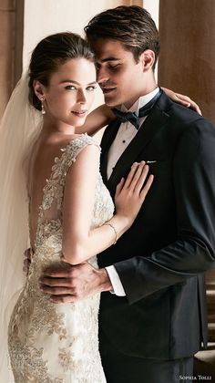 a bride and groom posing for a wedding photo