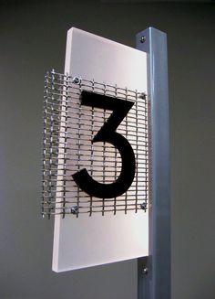 the number five is made out of metal mesh