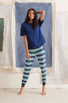 Mix & Match Pieces To Create Your Perfect Set. Cute enough to lounge in and comfy enough to sleep in. This harem style lounge pant has pockets, tapered cuffed legs and an adjustable drawstring waistband. Made in Canada. Ultra soft 93% Viscose from Bamboo / 7% Spandex. XS (0-2), S (0/2-4/6), M (6-8/10), L (10-12/14), XL (14-16/18), XXL (18-20/22). Machine washable & dryer friendly. Fabric patterns designed by and exclusive to This Is J. Fabric Patterns Design, Harem Pant, Style Lounge, Mens Loungewear, Maternity Shops, Loungewear Sets, Mix Color, Loungewear Set, Oversized Tee