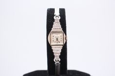 "This is an amazing vintage women's art deco;  made 1930-1940s Benrus 14k solid white gold with natural diamond mechanical, hand-winding watch. The watch works and keeps time well. Movement has been fully serviced.  The watch requires no battery, it is operated on wind up mechanism! It is ready to be worn. Condition: very good  ( Please see pictures for details ) Case: 14K solid white gold with real diamonds; lug to lug 41mm; width without crown 18mm Case back: 14k solid gold; ref # 20300 Crysta Vintage Diamond Jewelry With Polished Finish, Art Deco Engraved Jewelry And Watches For Formal Occasions, Art Deco White Gold Diamond Watch For Formal Events, Art Deco Engraved Jewelry And Watches For Formal Events, Art Deco White Gold Diamond Watch For Formal Occasions, Art Deco Diamond Jewelry As Gift, Diamond Art Deco Jewelry Gift, Vintage Diamond Jewelry And Watches With Polished Finish, Vintage Platinum Jewelry And Watches As Gift