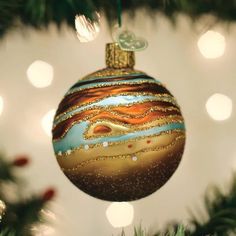 an ornament hanging from a christmas tree in the shape of a bauble