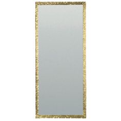 a gold framed mirror against a white background