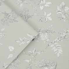 a wallpaper with white flowers and leaves on grey background, as well as an image of