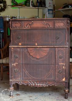 an old wooden dresser in a room