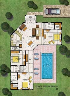 an aerial view of a house with a swimming pool and two car garages on the ground