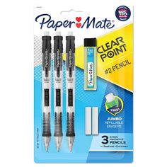 two pens and one pen are in front of the packaging for paper mate clear point