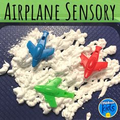 there are three plastic airplanes on top of some white foam and the words airplane sensory