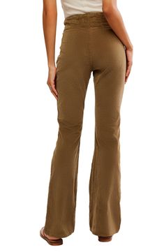 Designed to visually elongate your figure, these vintage-vibe pants are made from stretchy corduroy with a chic seamed waist and full-length flared legs. 33" inseam; 22" leg opening; 12" front rise; 14 1/2" back rise (size 29) 98% cotton, 2% elastane Dry clean or machine wash, tumble dry Imported Stretch Flare Corduroy Bottoms, Stretch Corduroy Flare Bottoms, Fitted Flare Corduroy Pants, Stretch Corduroy Full Length Bottoms, Stretch Full Length Corduroy Bottoms, Stretch Corduroy Full Length Pants, Stretch Full-length Corduroy Pants, Fitted Corduroy Wide Leg Bottoms, Fitted Wide Leg Corduroy Pants