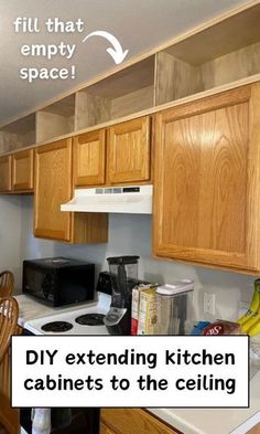 a kitchen with wooden cabinets and white counter tops has the words diy extending kitchen cabinets to the ceiling