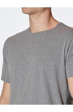 A curved hem enhances the fit of this versatile crewneck T-shirt made from soft, stretchy PYCA Pro® fabric that's wrinkle-resistant and retains its shape. 29 1/2" length (size Medium) Crewneck Short sleeves 62% polyester, 33% cotton, 5% spandex Machine wash, dry flat Imported Casual Plain T-shirt For Layering, Gray Stretch T-shirt For Loungewear, Sporty Crew Neck T-shirt For Layering, Sporty Plain Crew Neck Tops, Casual Soft Stretch Tops For Loungewear, Short Sleeve T-shirt With Ribbed Neckline For Loungewear, Gray Crew Neck T-shirt For Loungewear, Basic Crew Neck Top For Loungewear, Fitted Casual Jersey Top