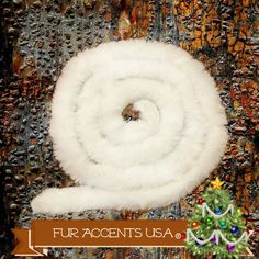 the fur accents usa christmas tree ornament is on display in front of a colorful background