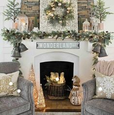 a living room filled with furniture and a fire place covered in christmas decorations on top of a mantel