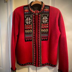 Beautiful Red Wool Icelandic Design Sweater Jacket With More-Finely-Than-Most Detailed Embroidered Front, Collar And Cuffs. Jacket Has A Full Front Zipper And Side Pockets, All Fully Lined. Medium Size - 23" Long, 15" From Armpit. Brand New Condition. Warm And Cozy! Red Fair Isle Long Sleeve Outerwear, Casual Red Outerwear With Fair Isle Pattern, Fitted Nordic Style Winter Outerwear, Nordic Style Fitted Long Sleeve Outerwear, Casual Red Fair Isle Pattern Outerwear, Casual Red Fair Isle Outerwear, Red Fair Isle Pattern Cardigan For Fall, Red Fair Isle Pattern Winter Cardigan, Red Fair Isle Cardigan For Winter