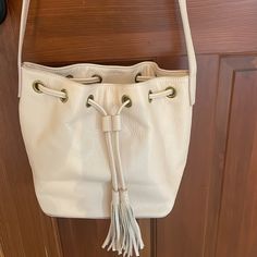 Jcrew Leather Bucket Bag With Tassels, New With Tag. Never Worn. Color: Dusty Tassel Hobo Bag For Shopping, Cream Bags With Tassels, Chic Daily Use Bucket Bag With Tassels, Chic Bucket Shoulder Bag With Tassels, Everyday Tassels Crossbody Shoulder Bag, Everyday Use Bucket Shoulder Bag With Tassels, Daily Use Crossbody Bucket Bag With Tassels, Daily Crossbody Bucket Bag With Tassels, Yellow Leather Bag