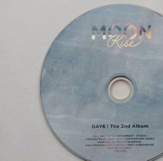 a cd disc with the words moon rise on it